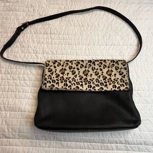 Supresa black and leopard leather handbag
